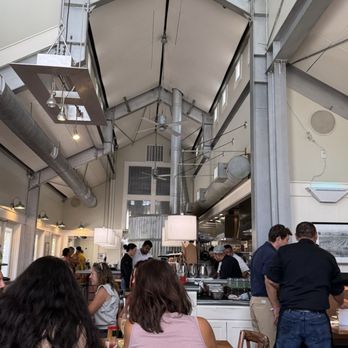 Boon Fly Cafe - nice architecture fits in a unique space and dining room is modern farmhouse/barn. A nice play on Sonoma and their vineyards and ranches. - American Near Me - Napa, California