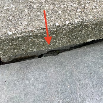 Sharp Contractors - So many gaps. Water will get in here and it will eventually fill with debris. Not to mention it looks awful. - Masonry/Concrete Near Me Sharp Contractors - So many gaps. Water will get in here and it will eventually fill with debris. Not to mention it looks awful. - Masonry/Concrete Near Me