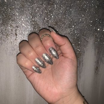 Pro Nails Salon - Kelly did an almond shape with a coat of a silver metallic polish with a sliver glitter on top, and then added rhinestones for extra shine! - Nail Salons Near Me - Torrance, California Pro Nails Salon - Kelly did an almond shape with a coat of a silver metallic polish with a sliver glitter on top, and then added rhinestones for extra shine! - Nail Salons Near Me - Torrance, California
