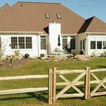 Green Horizon Landscape - a white house with a brown roof - Landscaping Near Me - State College, Pennsylvania Green Horizon Landscape - a white house with a brown roof - Landscaping Near Me - State College, Pennsylvania