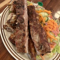 Half portion of Bbq Chicken and Pork Spare Ribs Combo with salad instead of rice and fries