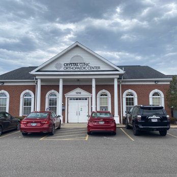 Crystal Clinic Orthopedic Center - Front of the entrance for the orthopedic doctors to the right, and the Crystal Clinic physical therapy to the left. - Orthopedists Near Me - Hudson, Ohio Crystal Clinic Orthopedic Center - Front of the entrance for the orthopedic doctors to the right, and the Crystal Clinic physical therapy to the left. - Orthopedists Near Me - Hudson, Ohio