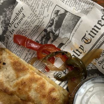 McCarthy's Irish Pub - Chicken and cheese quesadilla with alot of peppers and onions. - Irish Pub Near Me - Cazenovia, New York McCarthy's Irish Pub - Chicken and cheese quesadilla with alot of peppers and onions. - Irish Pub Near Me - Cazenovia, New York