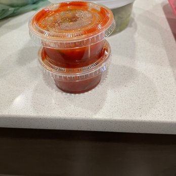 Mazatlan Mexican Restaurant - Two Condiment containers which is supposed to be "small salsa". - Mexican Near Me - Everett, Washington