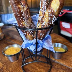 Gates Restaurant & Bar - Pretzel Sticks with cheddar + honey mustard sauce.