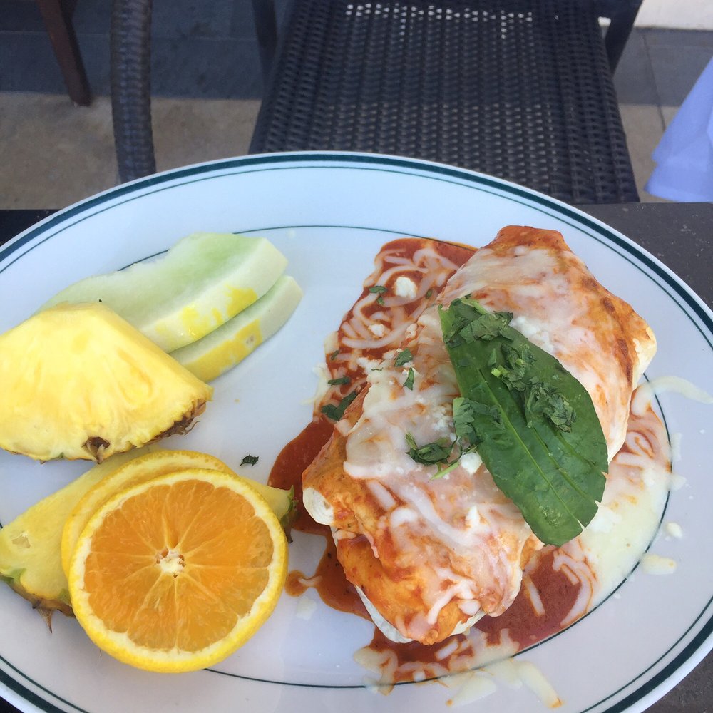 Daily Grill - Smothered Smothered Breakfast Burrito with a side of fruit - American Near Me - Palm Desert, California