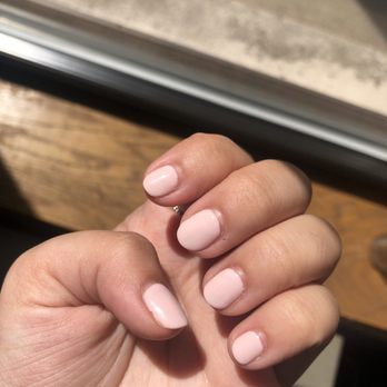 Harlem Nails - My manicure looks like I've had it for a week, but it only looks like this because he didn't cut my cuticles and was rushing with me. - Nail Salons Near Me - Chicago, Illinois