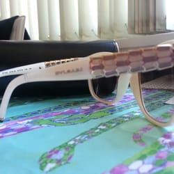 Sunglass Hut, Metrotown - The snake skin design. What a coincidence, they match my pink snake skin purse!!