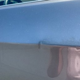 Driver's side door dent Driver's side door dent