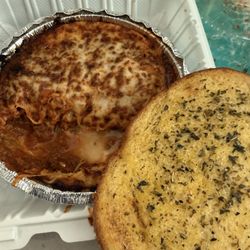 A few layers short of lasagna and regular toast with garlic, butter and herbs