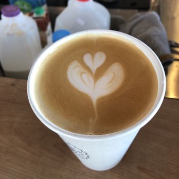 Sweet Bloom Coffee Roasters - The lovely decorated latte. - Coffee & Tea Near Me - Arvada, Colorado