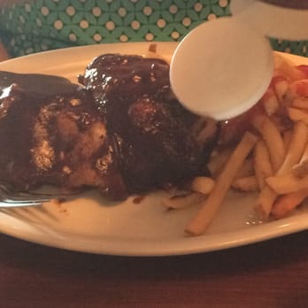 Ruby Tuesday - I/2 rack ribs $16.99 meat was falling off the bones.  Very tender. Sauce was liberally applied - good - Burgers Near Me - Gulf Breeze, Florida