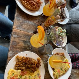 Belgian Waffles with bacon, Vegetarian Omelet, burger, mimosas, Coffee
