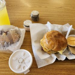 Next Stop Brunch - Classic bacon egg n cheese on a Kaiser bun. A blueberry muffin and a cappi. The pineapple Agua fresca was from next door