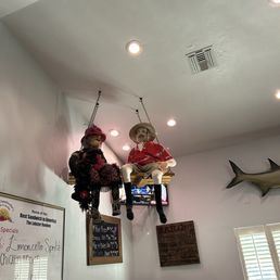 A lot of different and interesting things hanging on the wall