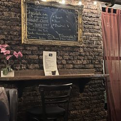 The Bar of Chocolate Cafe - Dessert menu on chalk board
