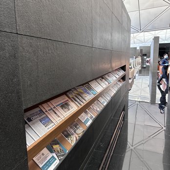 寰宇堂 - Follow this narrow corridor to the washrooms, Noodle Bar, and Coffee Loft. - Airport Lounges Near Me - Hong Kong, HK