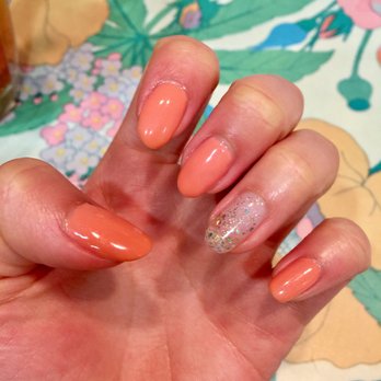 Hollywood Nails - A really pretty peach with light sparkle flakes in it. Also a pretty glitter that goes perfectly. Their gel last forever. Tammy did my nails - Nail Salons Near Me - Pleasant Hill, California