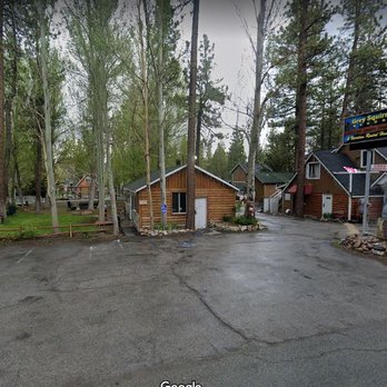 Grey Squirrel Resort & Vacation Rental Homes - Front of GS. You can see the contrast from the look of this area to the big (expensive) cabin w/debris & an unkept camper in our view - Big Bear Lake, CA