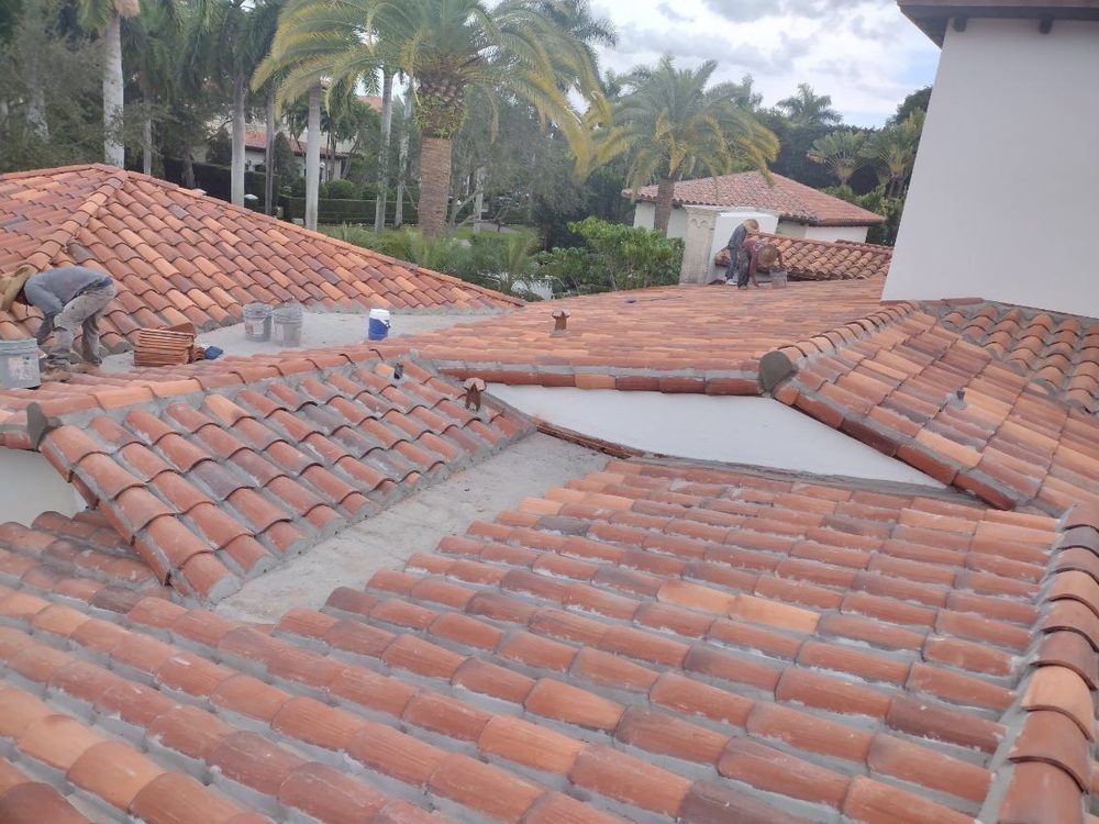 Slide of TJ Platinum Roofing