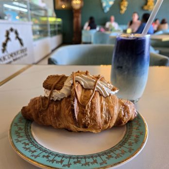 Unicorniverse Bakery & Cafe - Biscoff Croissant and Butterfly Pea Latte. - Breakfast & Brunch Near Me - Round Rock, Texas Unicorniverse Bakery & Cafe - Biscoff Croissant and Butterfly Pea Latte. - Breakfast & Brunch Near Me - Round Rock, Texas