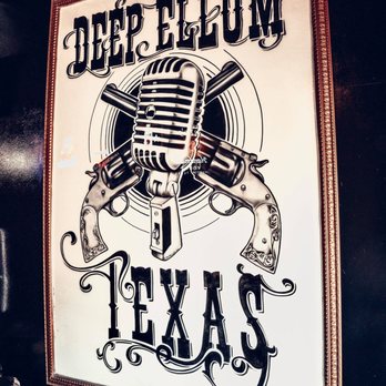 Elm St Saloon - an old microphone and guns - Dive Bars Near Me - Dallas, Texas Elm St Saloon - an old microphone and guns - Dive Bars Near Me - Dallas, Texas