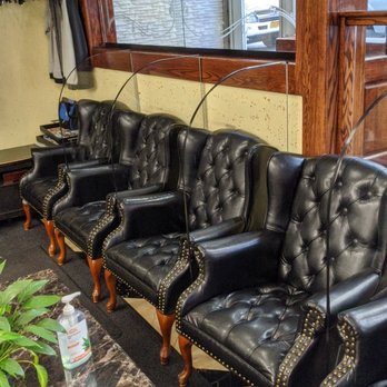 Ray's Barber Shop Tribeca - Wait area with dividers. - Barbers Near Me - New York, New York Ray's Barber Shop Tribeca - Wait area with dividers. - Barbers Near Me - New York, New York