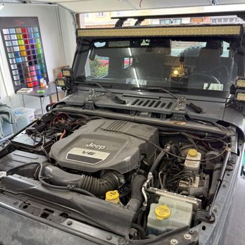 Yata Wraps - They removed the hood to work on it better - Vehicle Wraps Near Me