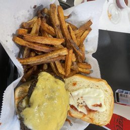 Double cheeseburger, mustard, mayo, ketchup and fries. Double cheeseburger, mustard, mayo, ketchup and fries.