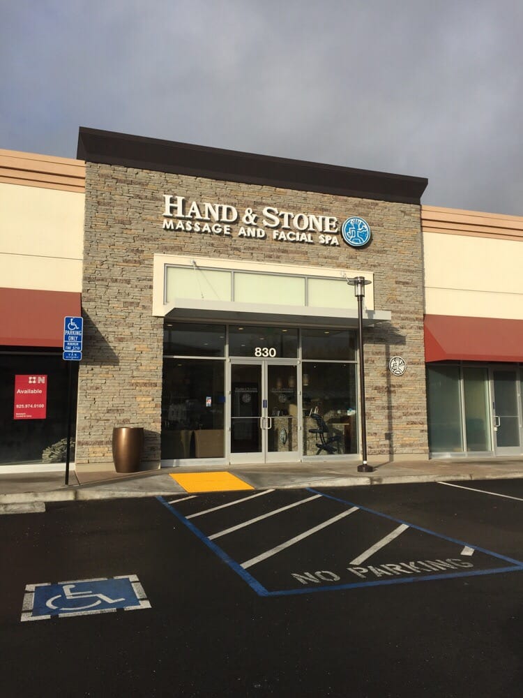 Hand & Stone Massage and Facial Spa Logo