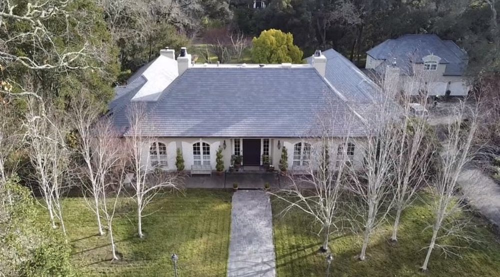 Slide of Exclusively Roofing