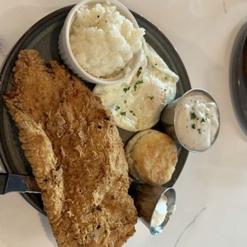 Talia's cafe - Chicken fried chicken with grits and gravy on the side. - Breakfast & Brunch Near Me - Allen, Texas
