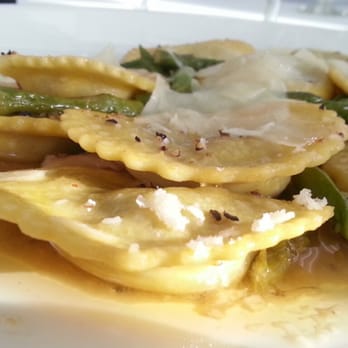 Bon Appetit - Portobello Mushroom Ravioli Tossed with Roasted Garlic, Asparagus, EVVO & Shaved Parmesan - New American Near Me - Dunedin, Florida Bon Appetit - Portobello Mushroom Ravioli Tossed with Roasted Garlic, Asparagus, EVVO & Shaved Parmesan - New American Near Me - Dunedin, Florida