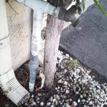 Doorstead - A before photo of the neat pipe with a small leak at the base - Property Management Near Me Doorstead - A before photo of the neat pipe with a small leak at the base - Property Management Near Me