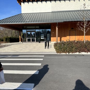 Dassai Blue - a person walking across the street - Breweries Near Me - Hyde Park, New York Dassai Blue - a person walking across the street - Breweries Near Me - Hyde Park, New York