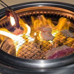 Grilling meats at Yakiniku Like.