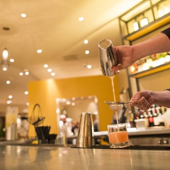Ruscello at Nordstrom - a bartender pouring a drink at a bar - Italian Near Me - Minnetonka, Minnesota