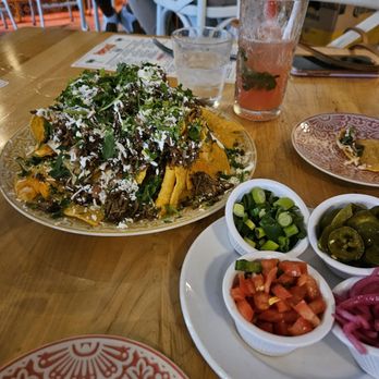 PapiChulo Tacos - Jupiter - Brisket Nachos/ Pico, Onions, Scallions, jalapeños on the side - Tacos Near Me - Tequesta, Florida PapiChulo Tacos - Jupiter - Brisket Nachos/ Pico, Onions, Scallions, jalapeños on the side - Tacos Near Me - Tequesta, Florida