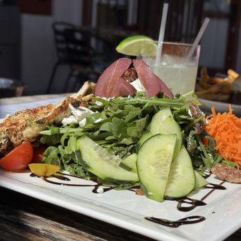 Sur at The Barnyard - Poached pear salad with added grilled chicken. - New American Near Me - Carmel, California Sur at The Barnyard - Poached pear salad with added grilled chicken. - New American Near Me - Carmel, California