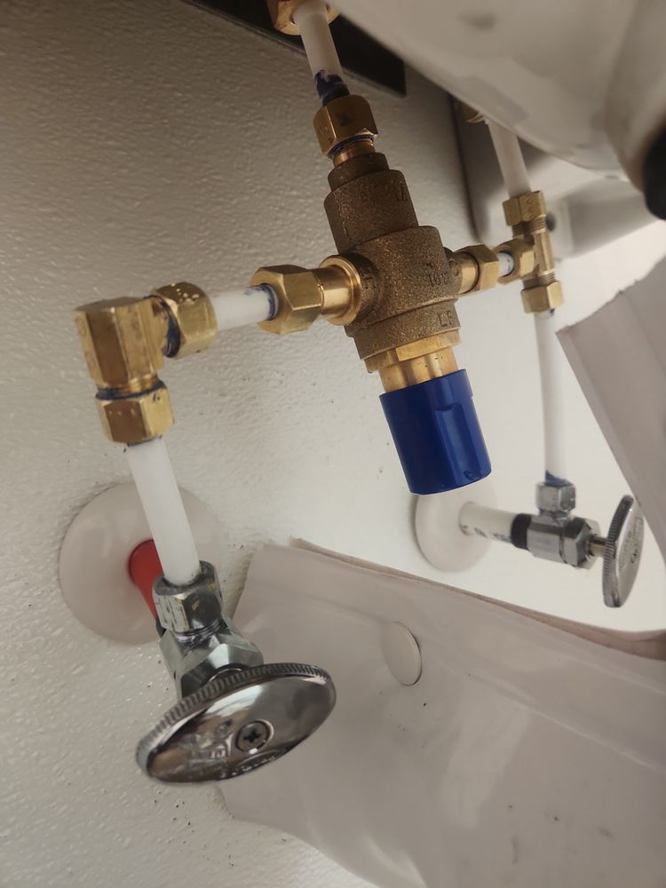 Slide of John's Drain Cleaning and Plumbing Services