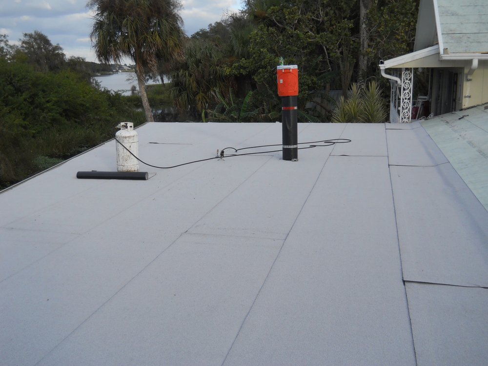 Slide of J & H Roofing