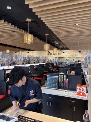 Kura Revolving Sushi Bar by null