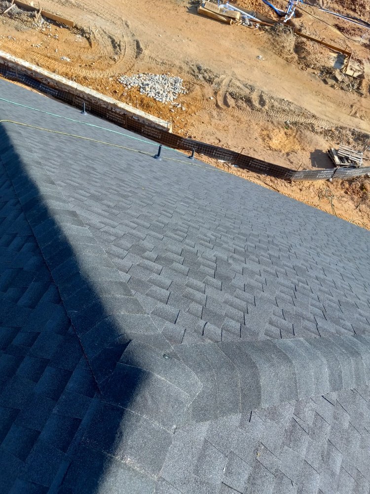 Slide of M&P Roofing and Construction