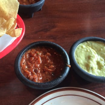 Los Cucos Mexican Cafe - Warm red salsa and a cold cilantro guacamole salsa when you are seated. - Tex-Mex Near Me - Katy, Texas