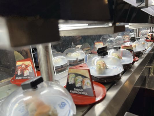 Kura Revolving Sushi Bar by null
