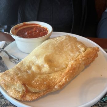 Gino's Pizza & Restaurant - This calzone was so big three people could eat wonderful delicious - Pizza Near Me - Poughkeepsie, New York Gino's Pizza & Restaurant - This calzone was so big three people could eat wonderful delicious - Pizza Near Me - Poughkeepsie, New York