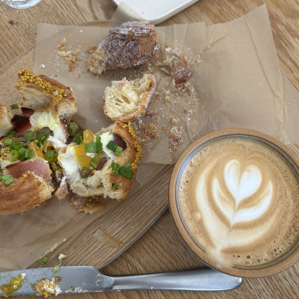 Backhaus - Burlingame - Cappuccino with spec and egg croissant bowl - Bakeries Near Me - Burlingame, California Backhaus - Burlingame - Cappuccino with spec and egg croissant bowl - Bakeries Near Me - Burlingame, California