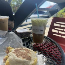 Breakfast sandwich and pistachio cold brew