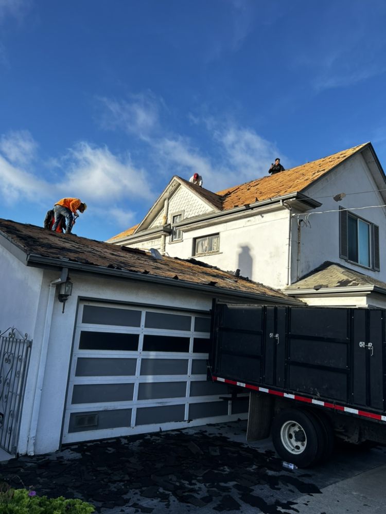 Slide of Rafael’s Tear-off & Hauling