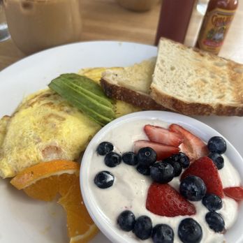 Shorehouse Kitchen - Ham, Swiss & avocado omelette with vanilla bean yogurt & sourdough toast - Breakfast & Brunch Near Me - Carlsbad, California Shorehouse Kitchen - Ham, Swiss & avocado omelette with vanilla bean yogurt & sourdough toast - Breakfast & Brunch Near Me - Carlsbad, California